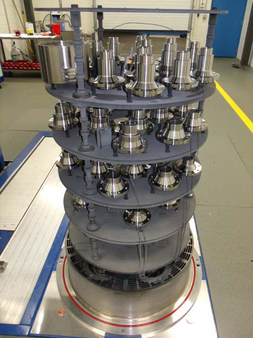 Production fixture loaded with steel components